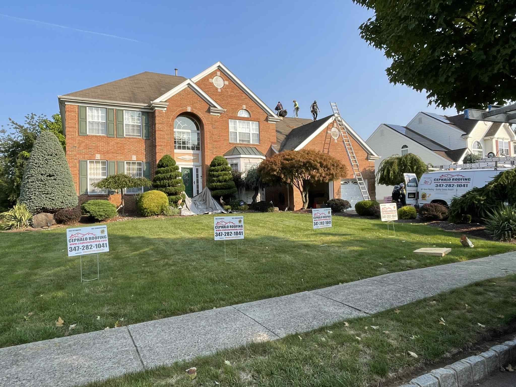 Professional gutter installation featuring K-style gutters and copper gutter systems